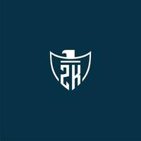ZK initial monogram logo for shield with eagle image vector design