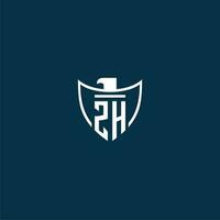 ZH initial monogram logo for shield with eagle image vector design