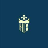 HX initial monogram shield logo design for crown vector image