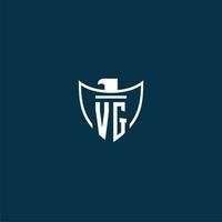 VG initial monogram logo for shield with eagle image vector design