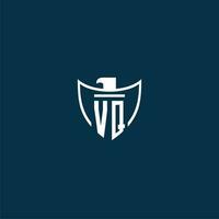 VQ initial monogram logo for shield with eagle image vector design