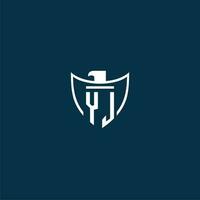 YJ initial monogram logo for shield with eagle image vector design