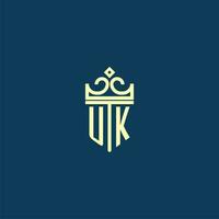 UK initial monogram shield logo design for crown vector image