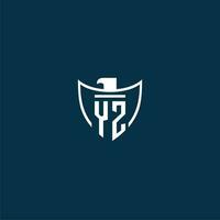 YZ initial monogram logo for shield with eagle image vector design