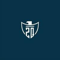 ZQ initial monogram logo for shield with eagle image vector design