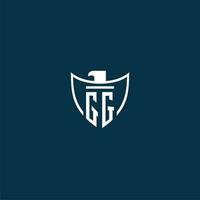 GG initial monogram logo for shield with eagle image vector design