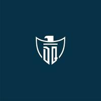 DQ initial monogram logo for shield with eagle image vector design