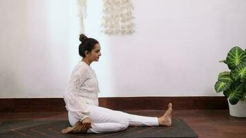 Video of a woman sitting in Vajrasana pose