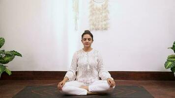 Video of a woman performing Bhastrika Pranayama