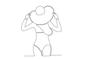 Rear view of a woman on the beach vector