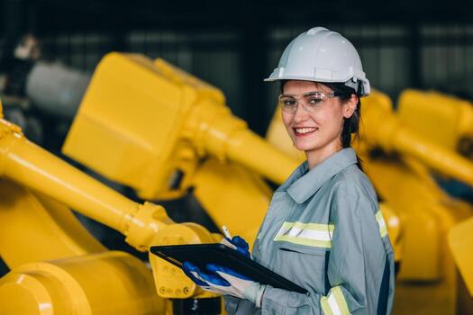 robótico ingeniero conducta regular mantenimiento por inspeccionando, pruebas, y corriendo software prueba a garantizar robot permanecer en estándar condición.grabación, informes dañado, incompleto artículos a supervisor foto