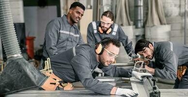 Wood turners measure and calculate the right size of workpiece dimension using hand and power tools. Cut, shape, rotate, smooth, and balance wood fixtures based on measurements and requirements. photo