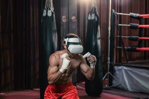 profesional Boxer vestir virtual realidad auriculares a contratar en inmersivo boxeo entrenamientos simulaciones mientras practicando su puñetazos tecnicas vivir, personalizado formación sesiones con boxeo entrenador foto