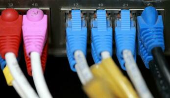 Technology center network server room with UTP Network cables photo