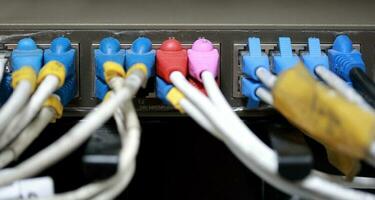 Technology center network server room with UTP Network cables photo