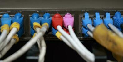 Technology center network server room with UTP Network cables photo