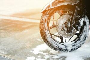 motorcycle wash at the car care shop photo