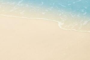 beautiful sandy beach and soft blue ocean wave. summer background concept photo