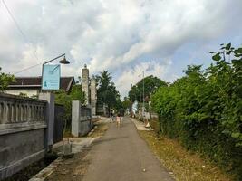 a view of a country road in blitar, indonesia photo