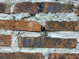 a close up of wall made of bricks textured background photo