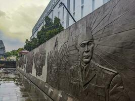 Blitar, indonesia - april, 2023 - Bung Karno wall sculptures in the Bung Karno library photo