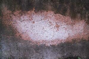 Texture of old rustic wall covered with brown stucco. Abstract background for design photo