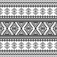 Aztec ethnic tribal seamless pattern with geometric shapes in black and white color. Design for textile, fabric, clothes, curtain, carpet, batik, ornament, wallpaper, background, wrapping, paper. vector