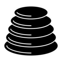 A readily available icon of spa stones, solid design vector