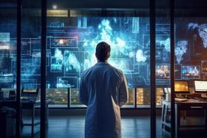 A scientist in a laboratory analyzing data on a computer screen. photo