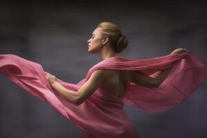 A woman with a pink scarf in her hair is posing for a photo. Concept breast cancer survivor embracing her journey. . photo