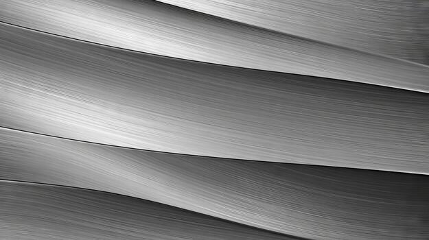 A textured metal surface with wavy patterns in black and white. photo