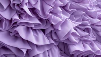 A purple ruffled fabric close-up. photo