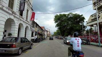 POV move at Jalan Kapitan Keling pass Goddess of Mercy temple video