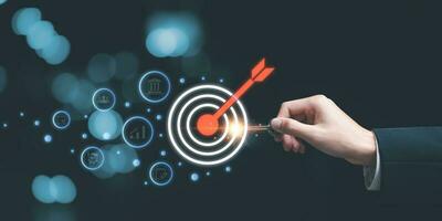 businessman showing business goal setting concept ,focused concepts , Target Growth development planning ,Organizational growth and objectives , marketing strategy planning ,Target customers photo