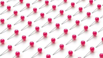Many sweet pink lollipops arranged in rows on white background photo