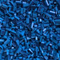 Blue toy bricks background. 3D Rendering. photo