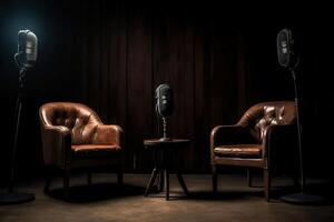 Two chairs and spotlights in podcast or interview room on dark background. photo