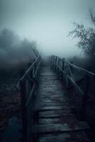 Old wooden bridge leading to nowhere in the fog, broken, gloomy dark blue, mysterious, loneliness. photo