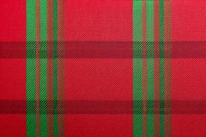 red fabric textile pattern, plaid background, linen cotton. photo