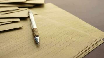 envelope, empty paper and fountain pen on table video