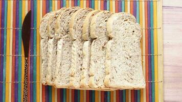 close up of stack of baked bread on table video