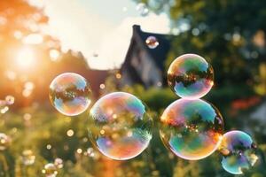 Soap bubbles against a blurred light natural summer background. photo