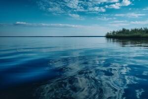 A scene in which the entire light blue sky is reflected in the water. photo