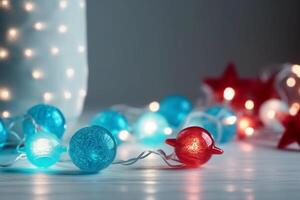 Christmas background with blue light luminous garlands and red stars on a white wooden background with copy space. photo
