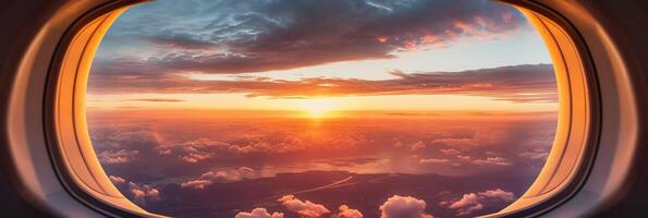 The view from the plane window to the sunset. Aerial view. photo