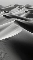 photographs of desert of surfaces, dark gray and white. photo