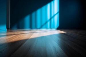 Blue empty wall and wooden floor with interesting light glare. Interior background for the presentation. photo