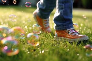 Close up big bubbles blurred background of a child's legs wearing white clothes. photo