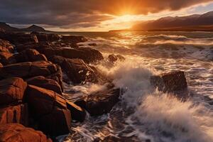 The waves are crashing over the rocks at sunset. photo