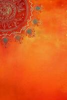 orange Pantone color background paper texture Rangoli pattern painting. photo